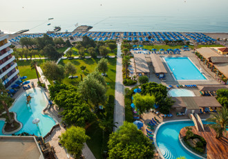 Pools and beach aerial view, Esperides Beach Family Resort, Kalithea, Rhodes, Greece